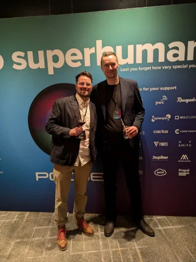 Two people at an industry event