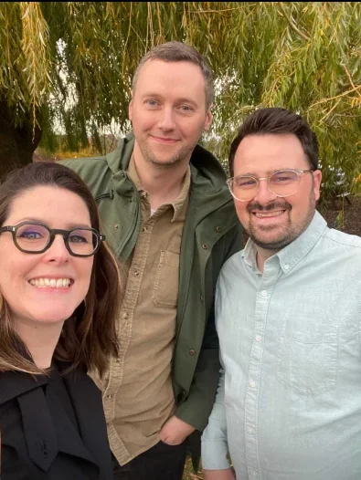 Three people together outdoors